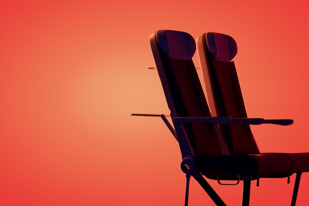 Artistic 3D render showing two seats, one reclined, in orange colorway.