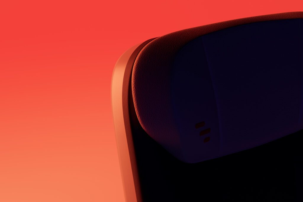 Detail-focused orange render of the backrest with sculptural lighting.